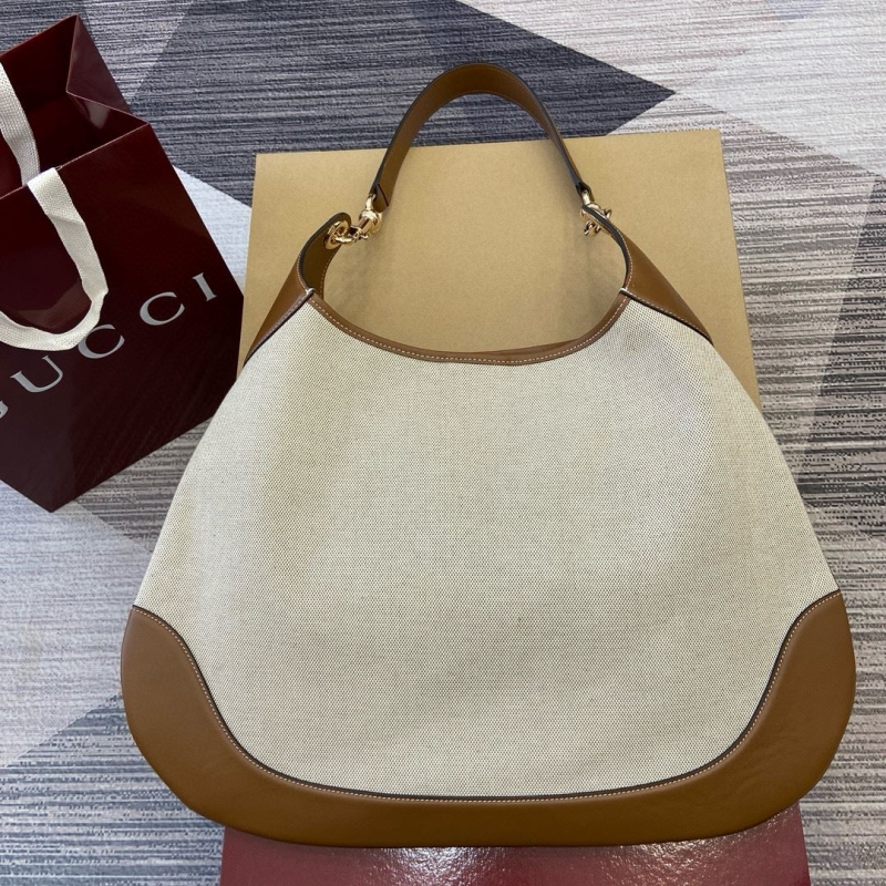G*u*i top handle bags